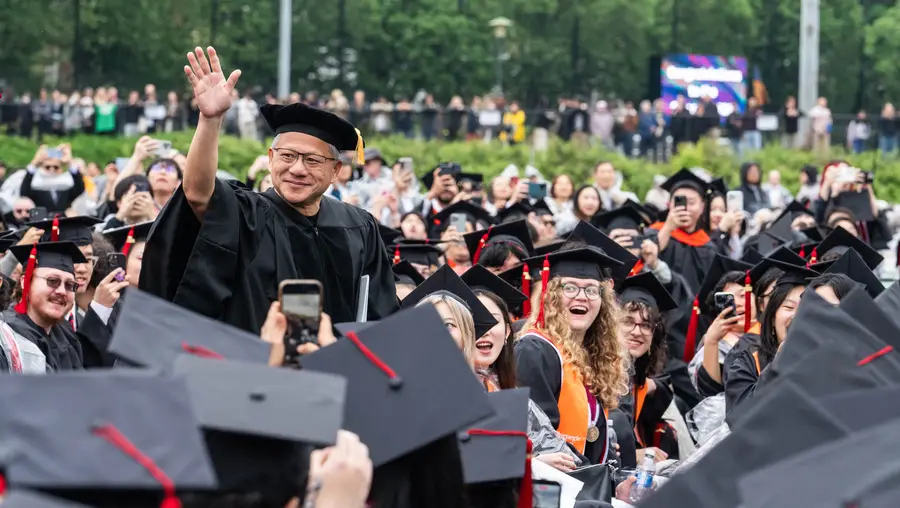 Jensen Huang walks in the procession at CMU Commencement. 