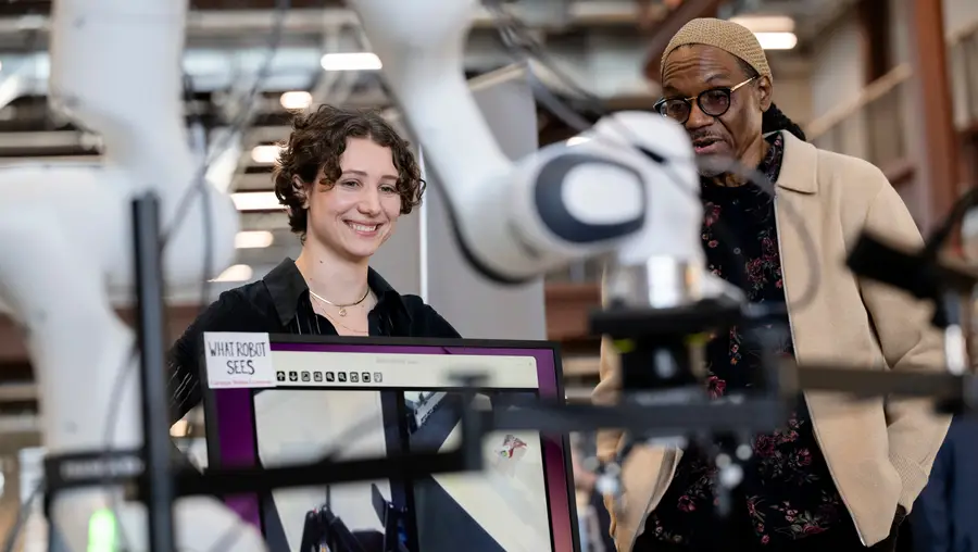 Two community members at CMU's Robotics Innovation Center.