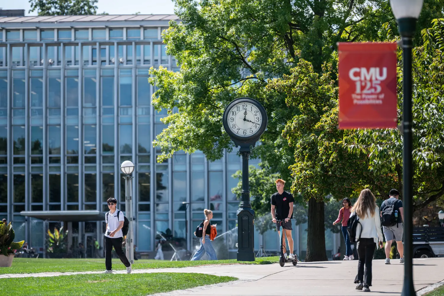 Students walk on CMU campus. 