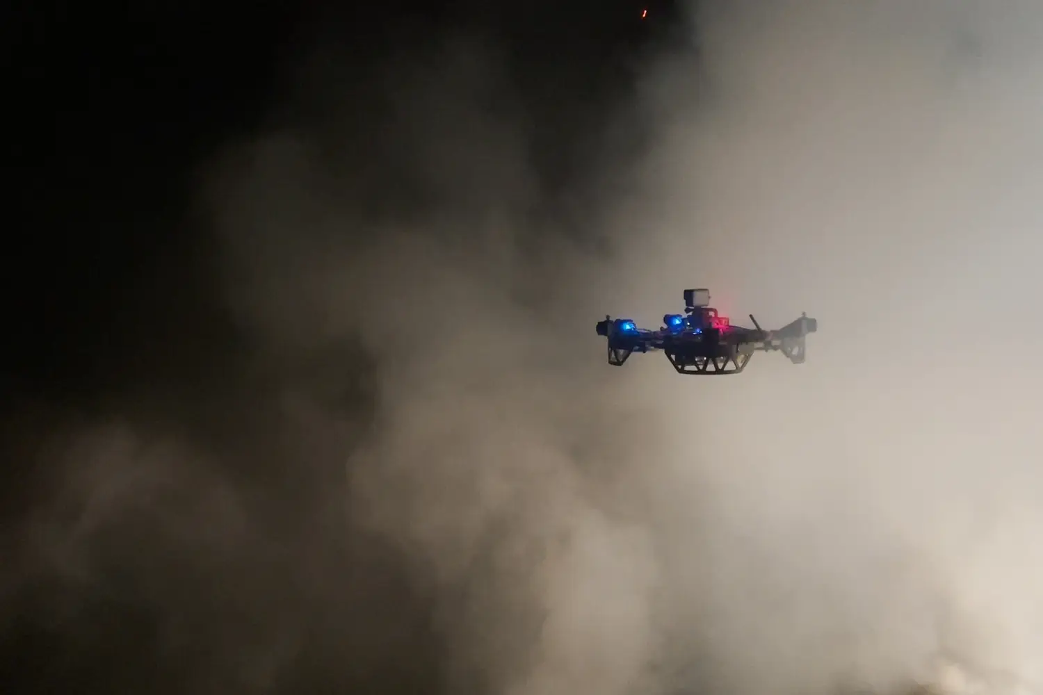 A drone navigates smoke during a wildfire.