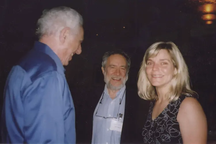 Shinn-Cunningham (right) with her mentor, Nat Durlach (left) and advisor H. Steven Colburn (center) at an ASA event in 2003. 