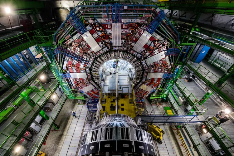 physicists and engineers replace the heart of the Large Hadron Collider’s Compact Muon Solenoid experiment. Photo courtesy of CERN