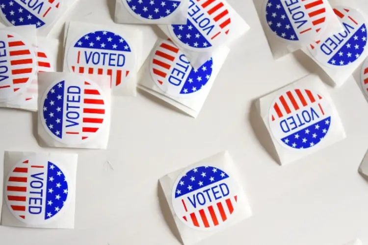 Voting stickers on a table.