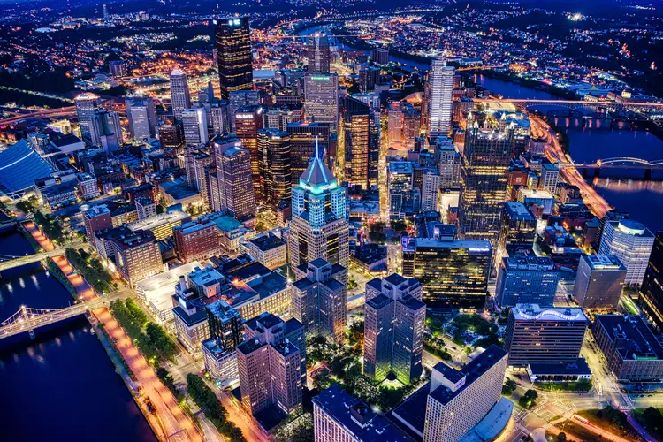 An aerial photo of Pittsburgh at night. 