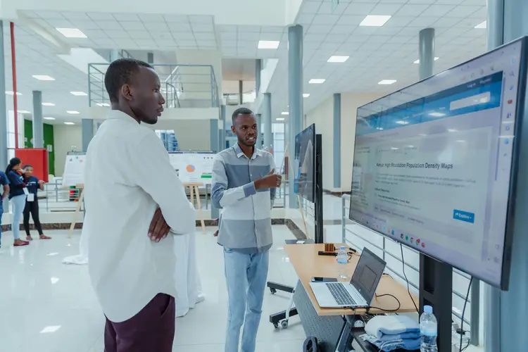 Students looking at a computer screen. 