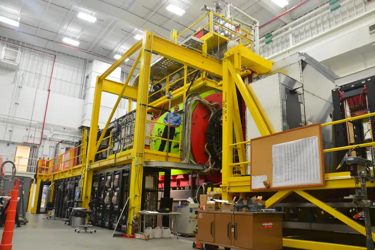 Curtis Meyer stands on the GlueX platform at the J-Lab Continuous Electron Beam Accelerator Facility in Newport News, Virginia.