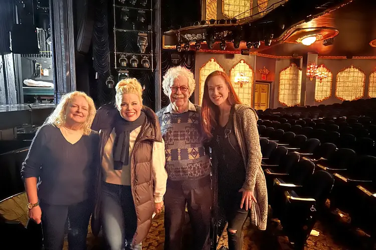 A group photo in a theater