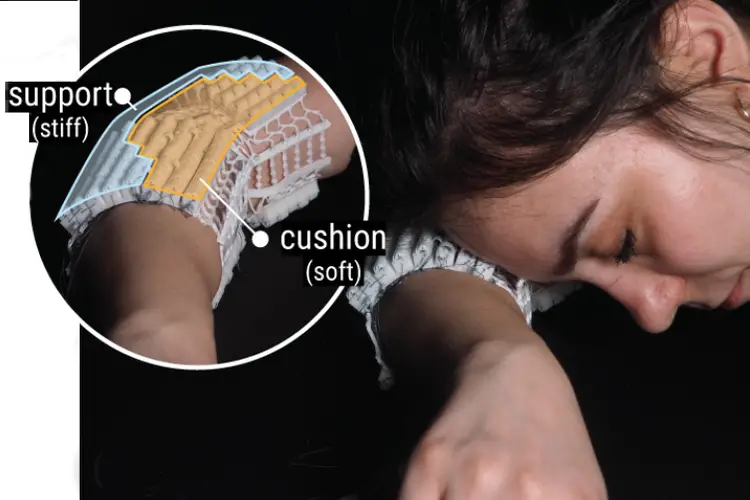 A woman sleeps with her head resting on her arm while wearing a special armband that adjusts its softness and support.