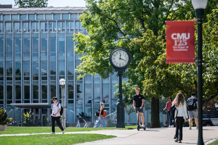 Students walk on CMU campus. 