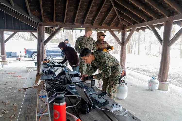 Participants in a multi-event robotics field competition.