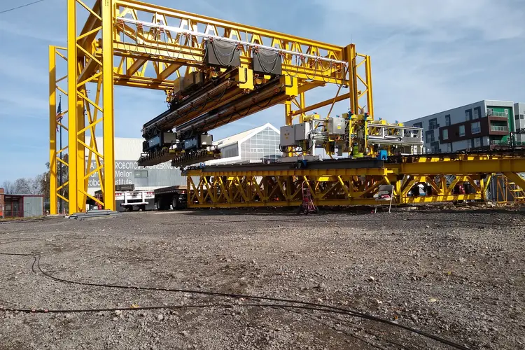 For the U.S. Army Corp of Engineers, NREC engineered Armor 1, an automated system designed to assemble and place large concrete mats that stabilize the banks of the Mississippi River. The production-scale system uses multiple robotic cranes, machine vision and automated tying mechanisms to make a hazardous, labor-intensive process safer and faster.