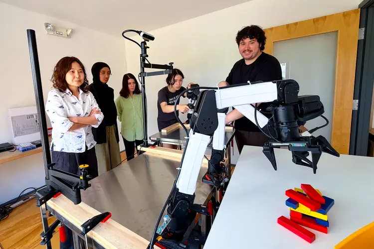 Researchers set up and operate robotic arms using RIO’s unified interface for robot control and teleoperation.