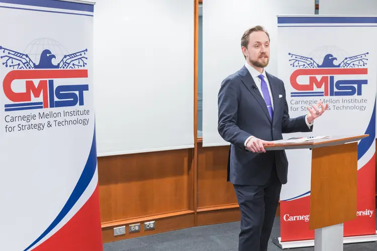 Harry Krejsa, director of studies at CMIST, speaks at a podium